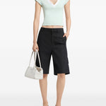 Polo con scollo a V in verde Courrèges - donna 