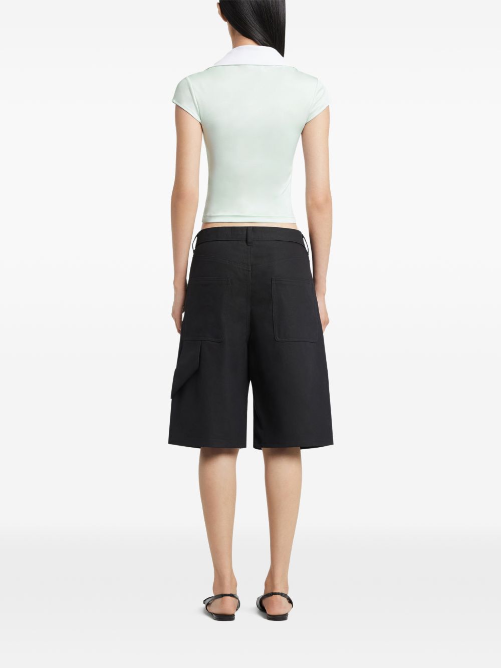 Polo con scollo a V in verde Courrèges - donna 