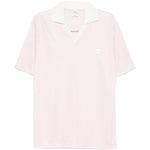 Polo con logo e ricamo a v in bianco Courrèges - donna 
