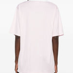 Polo con logo e ricamo a v in bianco Courrèges - donna 