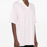Polo con logo e ricamo a v in bianco Courrèges - donna 