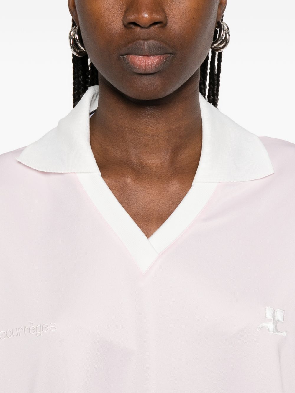 Polo con logo e ricamo a v in bianco Courrèges - donna 