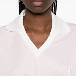 Polo con logo e ricamo a v in bianco Courrèges - donna 
