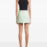 Minigonna Reedition con logo in verde Courrèges - donna 