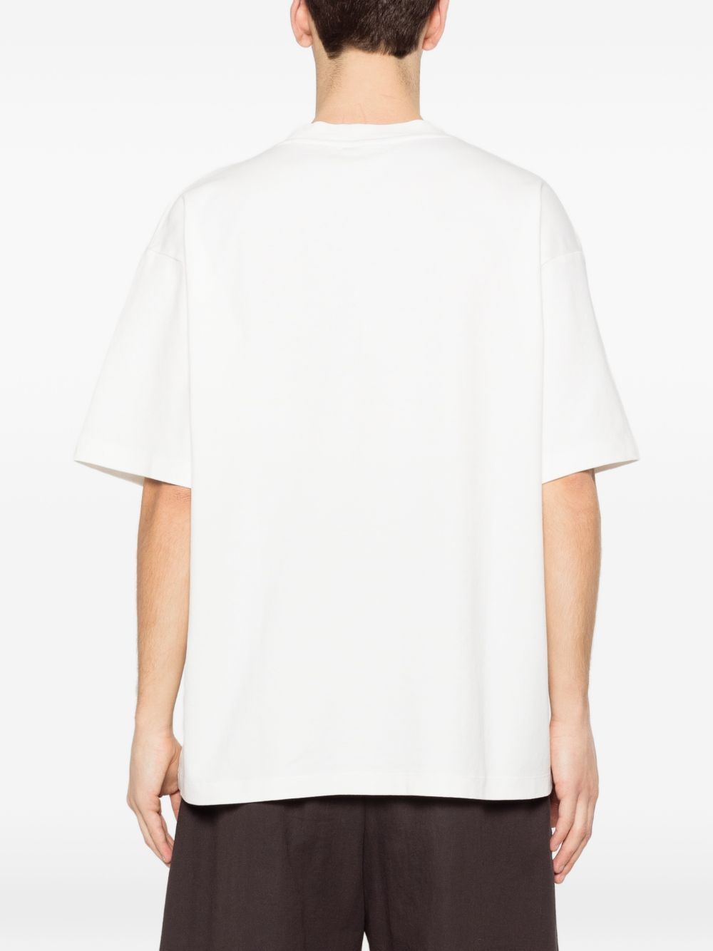T-shirt Hibiscus Club a fiori in bianco Drole de monsieur - uomo 