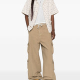 Pantaloni con tasche cargo in beige Erl - unisex 
