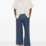 Pantaloni con passanti per cintura in blu Erl - unisex 