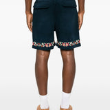 Shorts in twill con ricami floreali in blu Found - uomo 
