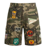Pantaloncini con stampa patchwork in verde Found - uomo 