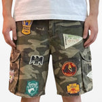 Pantaloncini con stampa patchwork in verde Found - uomo 
