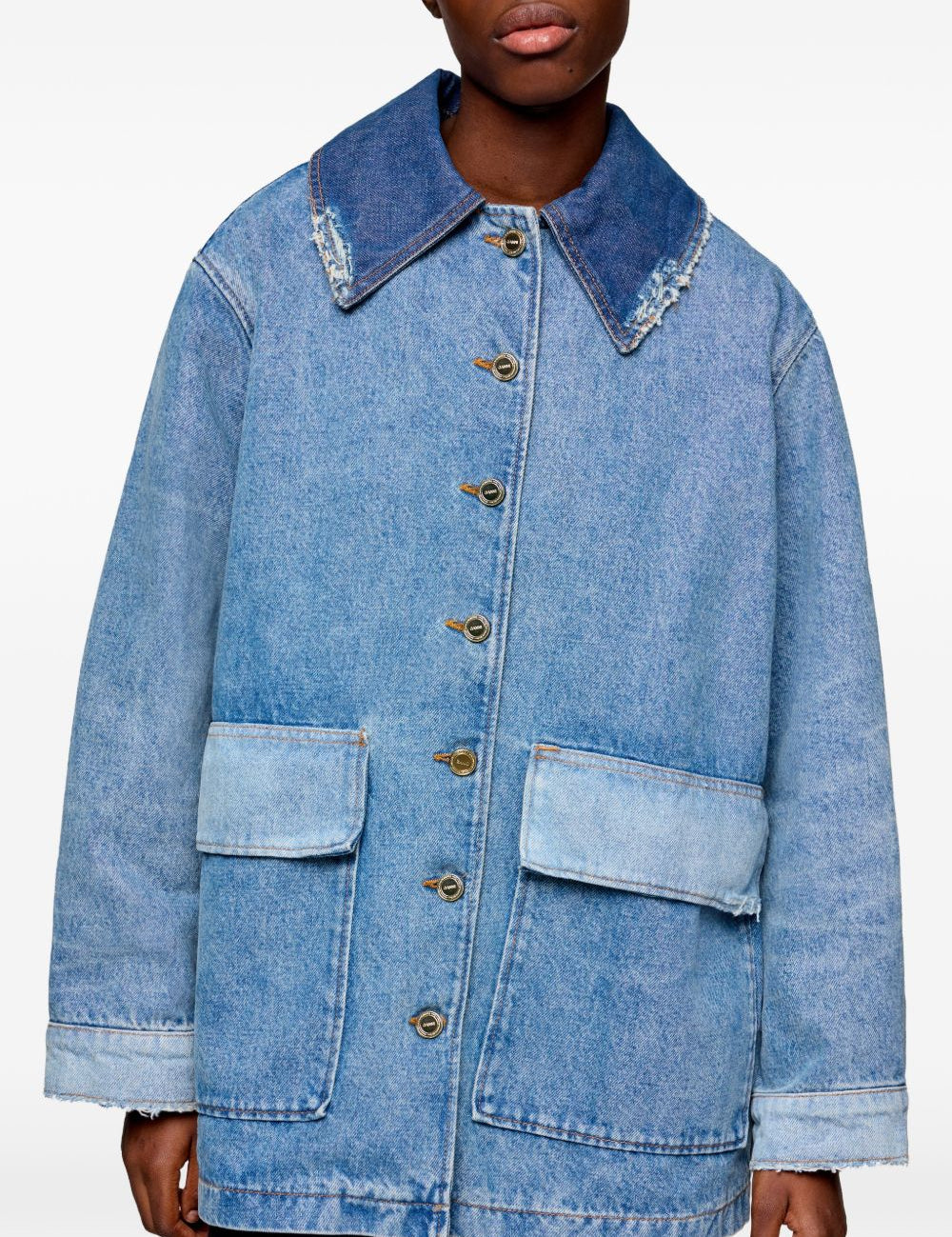 Giacca denim con design patchwork con tasche in blu 