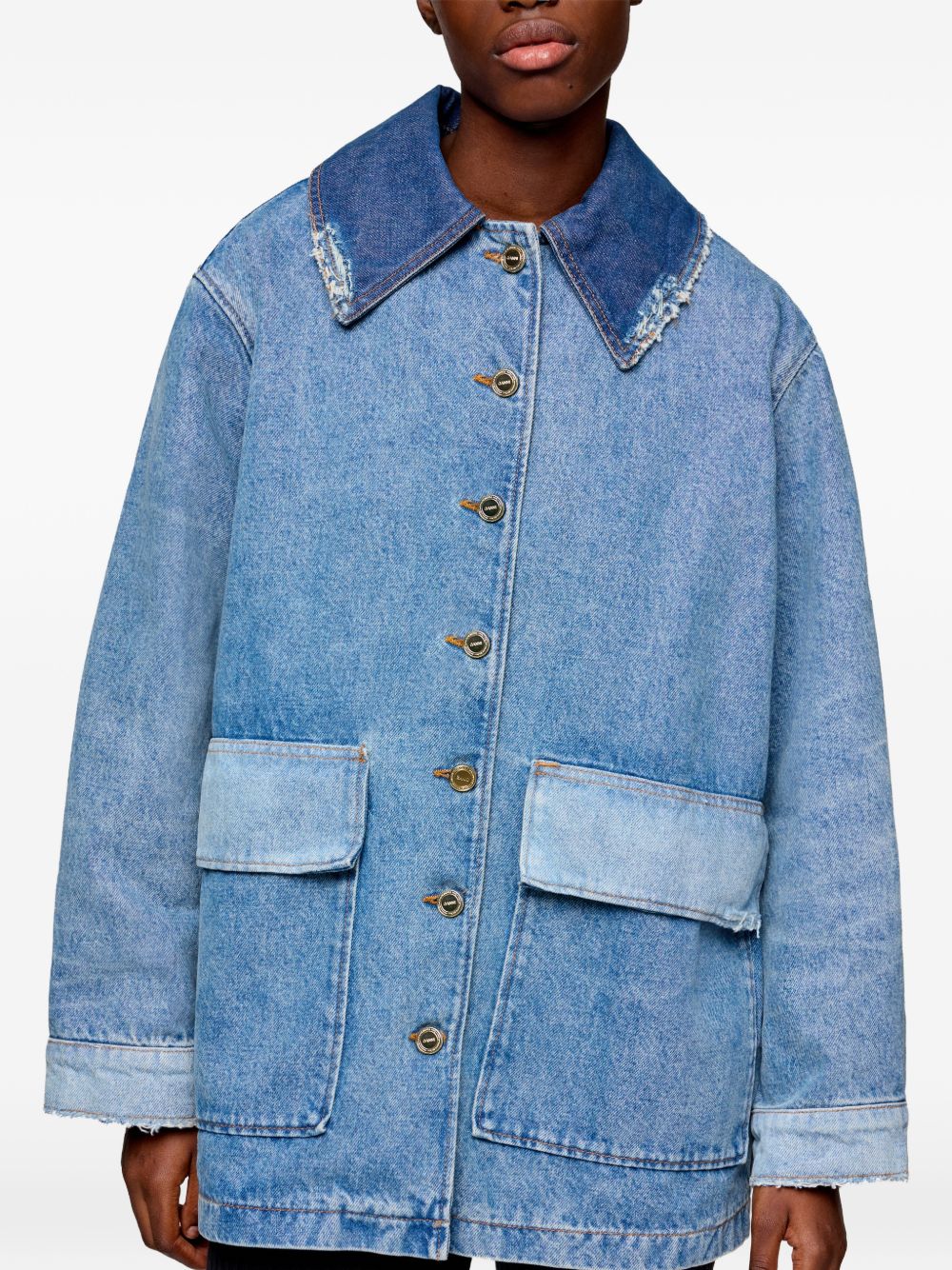Giacca denim con design patchwork con tasche in blu 