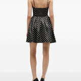 Abito mini a pois in nero Ganni - donna 