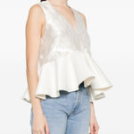 Top con peplum in bianco Ganni - donna 