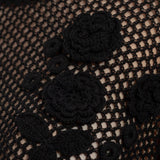 Top all'uncinetto con applicazioni a fiore in nero Ganni - donna 