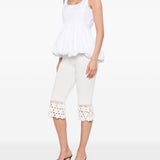 Pantaloni a coste con dettaglio all'uncinetto in bianco Ganni - donna 