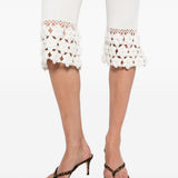 Pantaloni a coste con dettaglio all'uncinetto in bianco Ganni - donna 