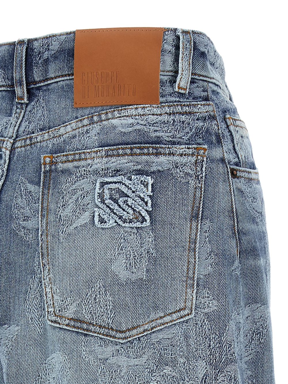Jeans ricamato in blu 