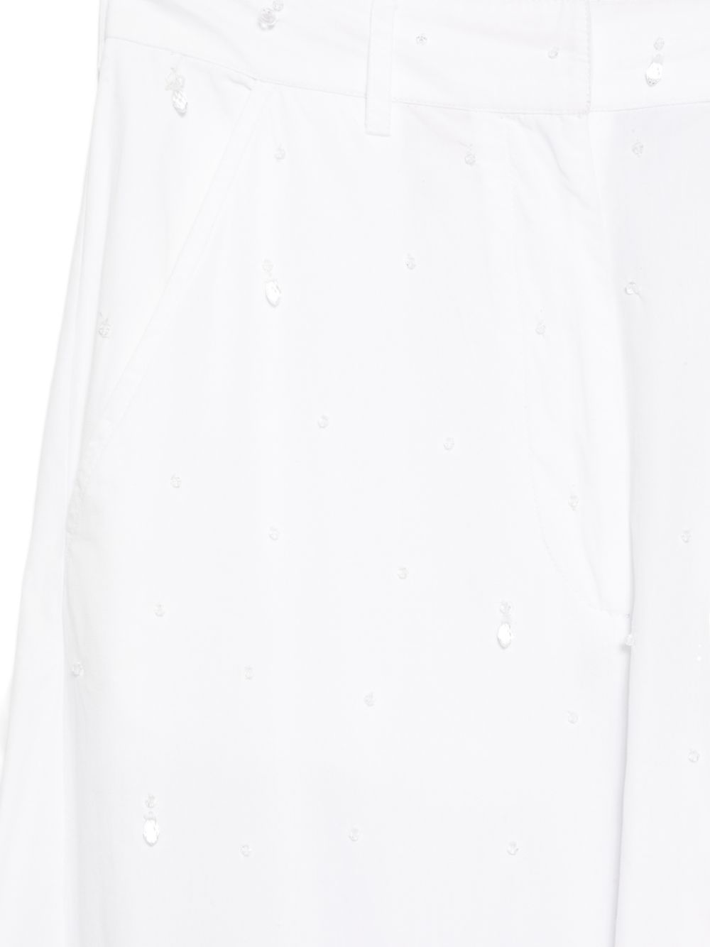 Pantaloni a gamba ampia con perline in bianco 