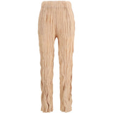 Pantaloni plissettati in rosa pesca gongdid design - donna 