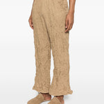 Pantaloni plissettati in beige gongdid design - donna 