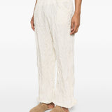 Pantaloni con vita elasticizzata in bianco Gongdid design - uomo 