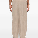 Pantaloni con vita elasticizzata in beige Gongdid design - uomo 