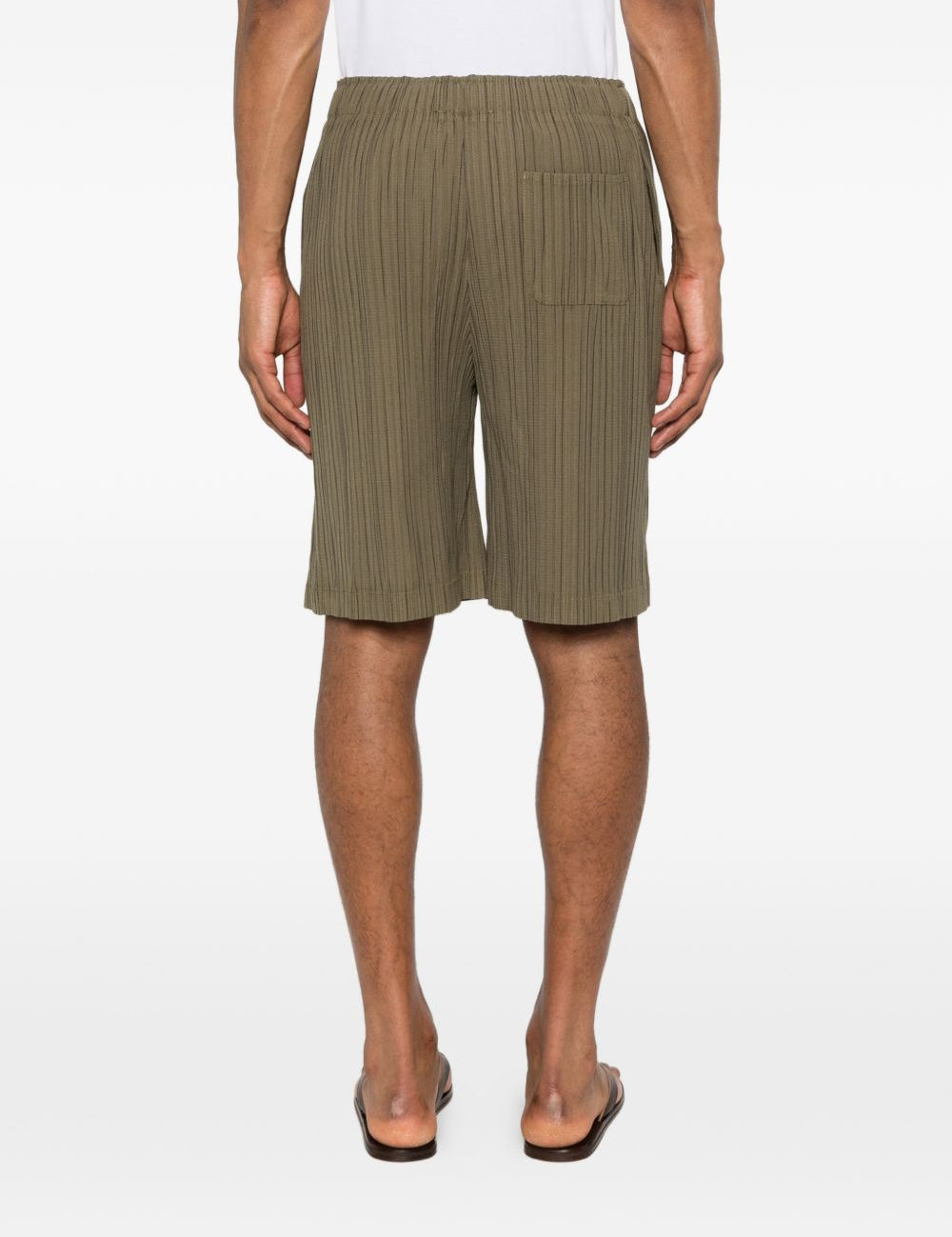Pantaloncini elasticizzati con pieghe in verde Gongdid design - uomo 