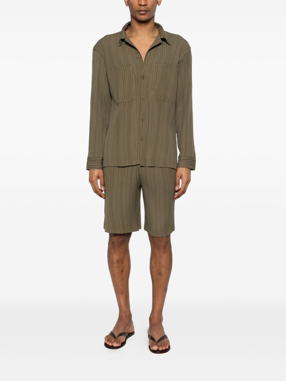 Pantaloncini elasticizzati con pieghe in verde Gongdid design - uomo 