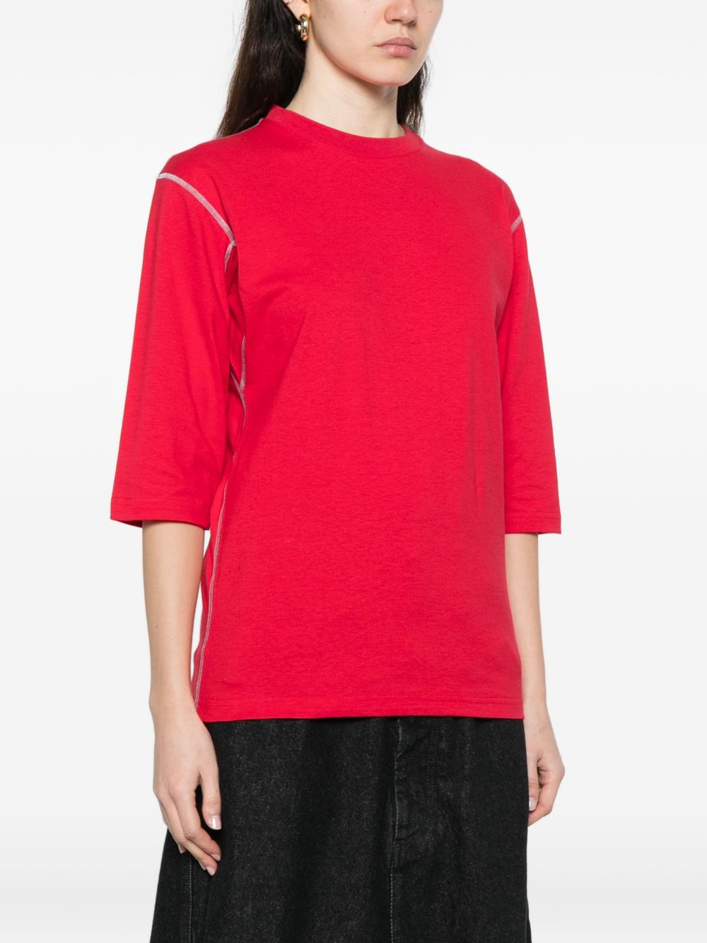 T-shirt a manica corta con impunture in rosso Gr10k - donna 