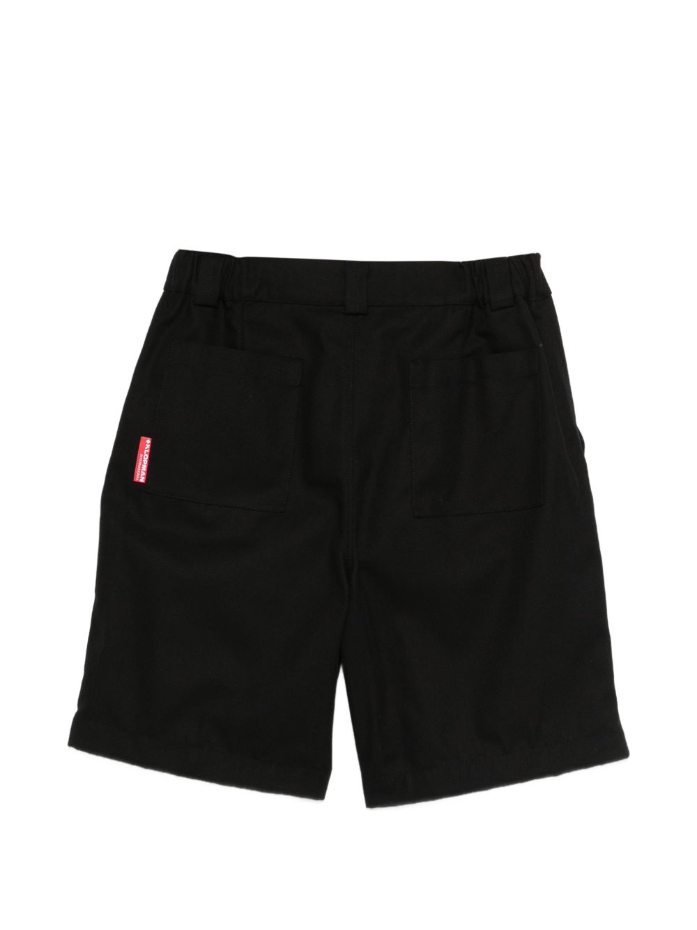 Pantaloncini con piega anteriore in nero Gr10k replicated - uomo 