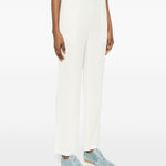 Pantaloni con pieghe in bianco Issey miyake  - donna 