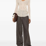 Top a maniche lunghe con design plissettato in avorio Issey miyake  - donna 