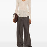 Top a maniche lunghe con design plissettato in avorio Issey miyake  - donna 