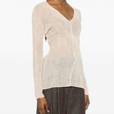 Top a maniche lunghe con design plissettato in avorio Issey miyake  - donna 