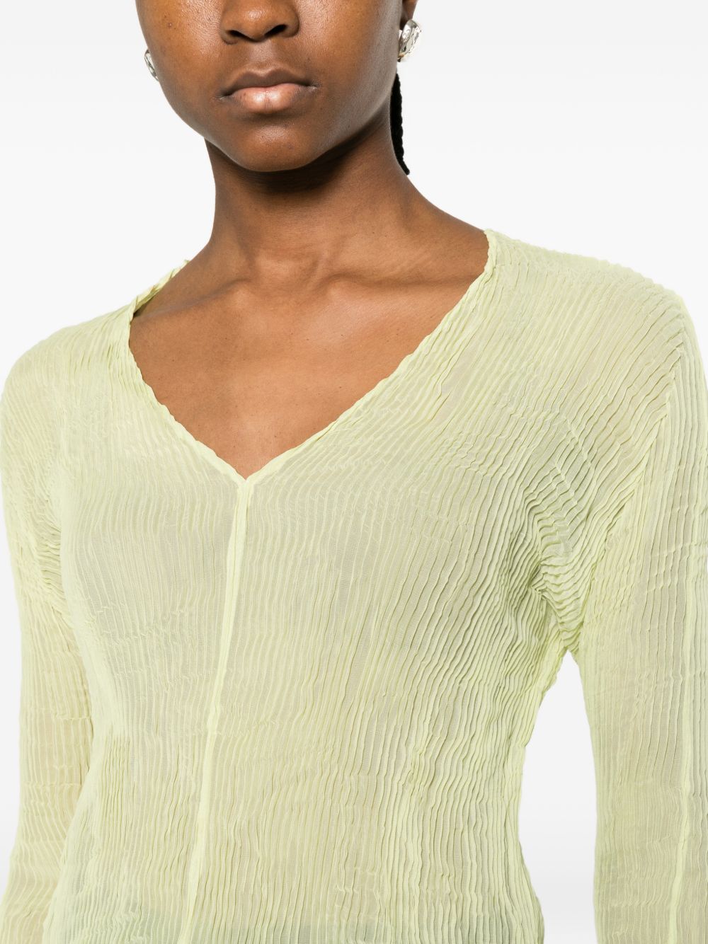 Top a maniche lunghe con design plissettato in verde lime Issey miyake  - donna 