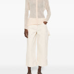Top a maniche lunghe con design plissettato in avorio Issey miyake  - donna 