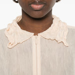 Top a maniche lunghe con design plissettato in avorio Issey miyake  - donna 