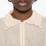 Top a maniche lunghe con design plissettato in avorio Issey miyake  - donna 
