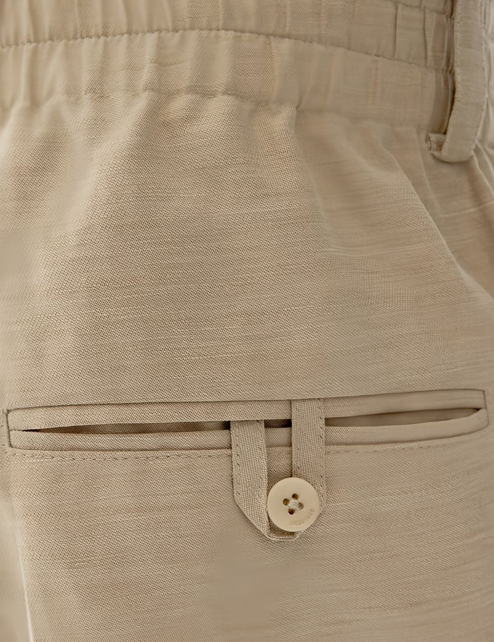 Pantaloni Croisière a pieghe con elastico in vita in beige Jacquemus - uomo 