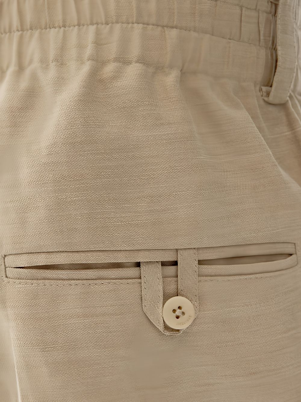 Pantaloni Croisière a pieghe con elastico in vita in beige Jacquemus - uomo 