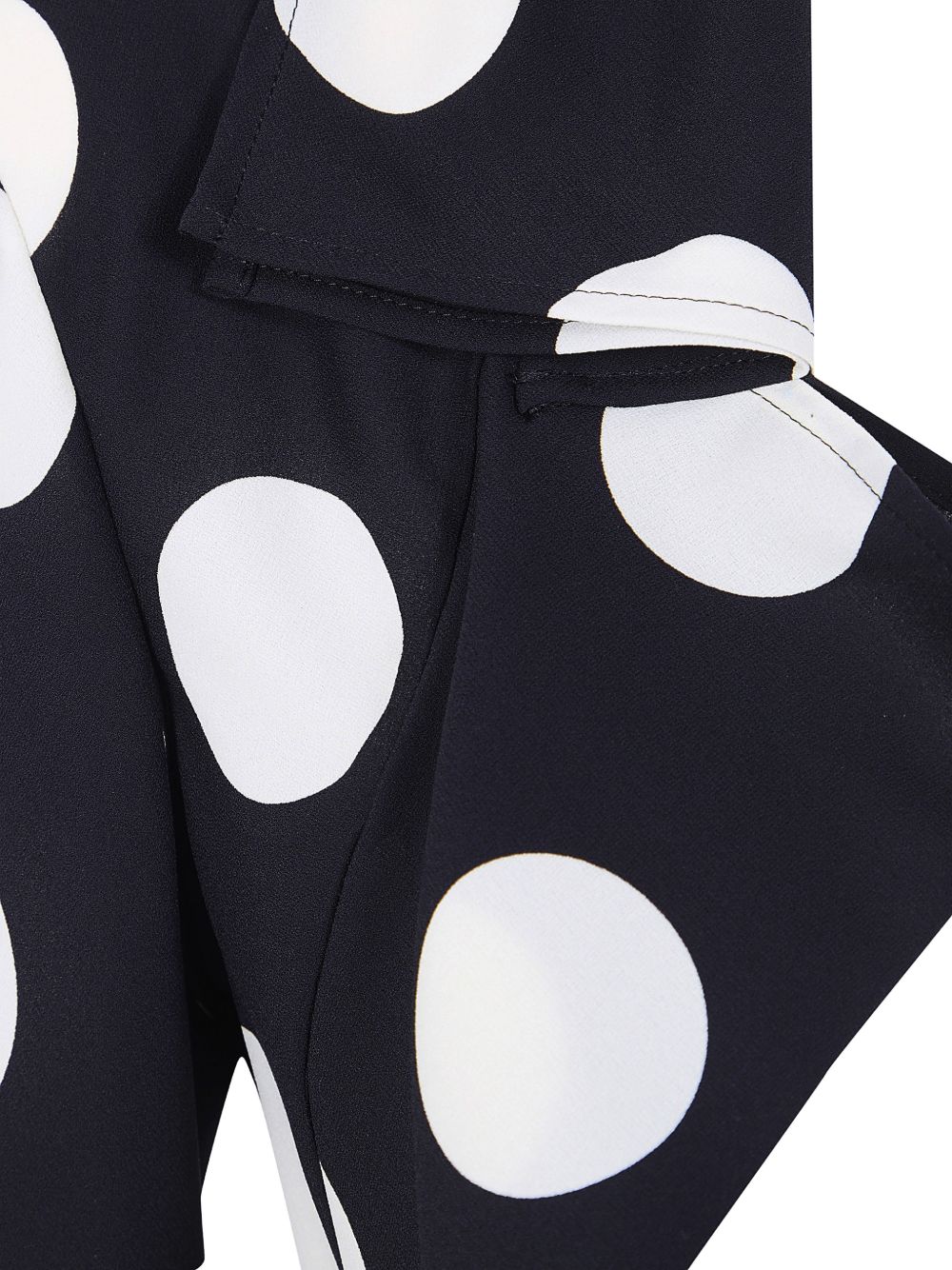 Blazer a pois in nero e bianco 
