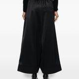 Pantaloni a gamba ampia con finitura satinata in nero Junya watanabe - donna 