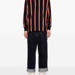 Polo a maniche lunghe a righe in nero Junya watanabe - uomo 