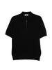 Polo a coste con zip in nero Kangra - uomo