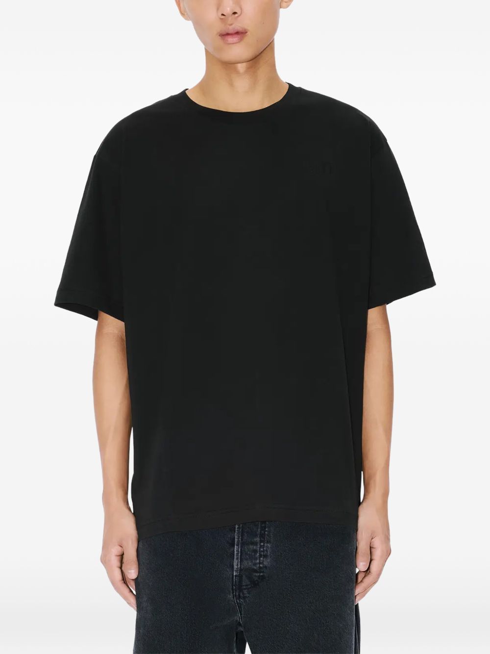 T-shirt con applicazioni di fiori in nero Kenzo - uomo 