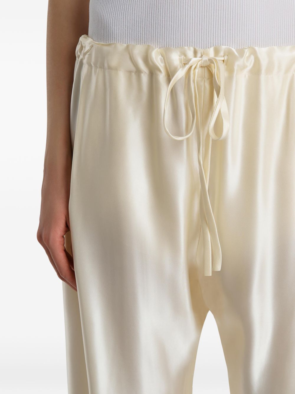 Pantaloni Rohen satinati in avorio Khaite - donna 