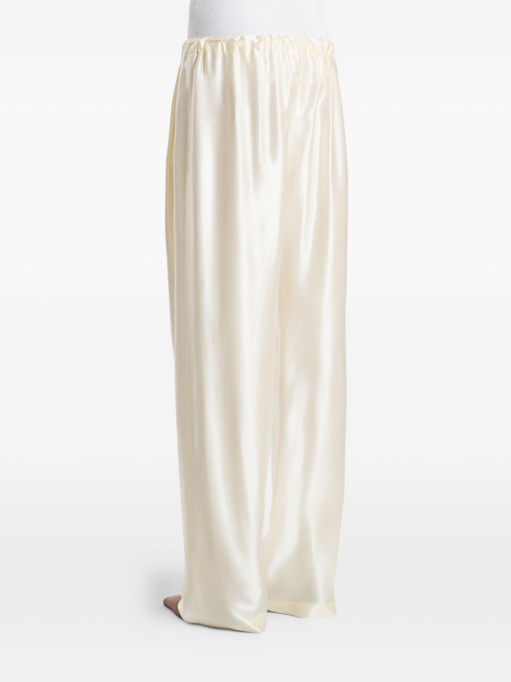 Pantaloni Rohen satinati in avorio Khaite - donna 