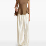 Pantaloni Rohen satinati in avorio Khaite - donna 