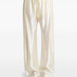 Pantaloni Rohen satinati in avorio Khaite - donna 